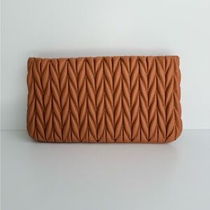 Shirleah Chic Tan Quilted Clutch